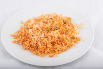red rice with peas on the plate