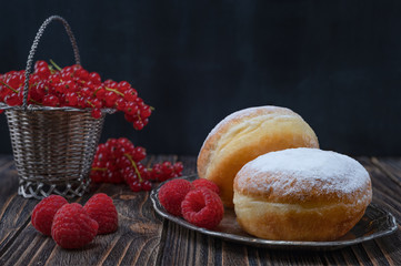 Berliner jelly filled doughnut with raspberry and redcurrant.