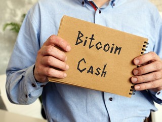 Business concept meaning Bitcoin cash with sign on the sheet.