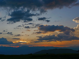 Evening atmosphere of the sky over the hills in rural area in Chang Khoeng, Mae Chaem, Chiang Mai, Thailand - Pa Bong Piang