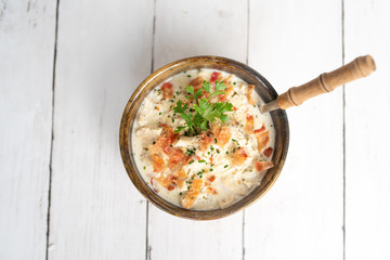 Shredded chicken in cream cheese sauce and bacon cooked in slow cooker