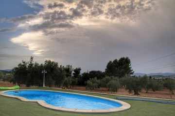 Large oval pool with mountain views