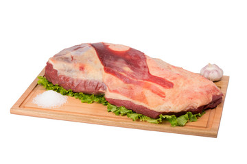 fresh and raw beef meat on cutting board on white background