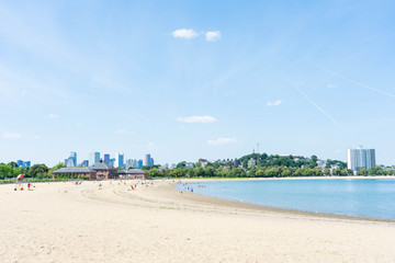 Fototapeta na wymiar Boston skyline from the harbor point showing the beach landscape near Old Harbor and Pleasure Bay.