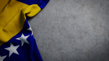 Flag of Bosnia and Herzegovina on concrete backdrop. Bosnian flag background with copy space