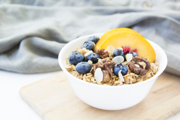 Oatmeal porridge with blueberries. Superfood for healthy nutritious breakfast