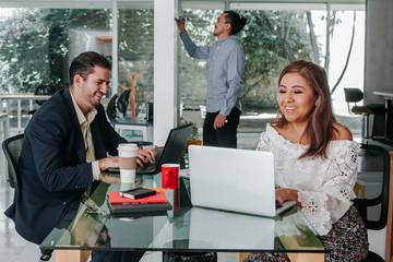 Hispanic teamwork with computer at office in Mexico, Successful business mexican people teamwork