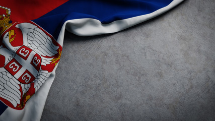 Flag of Serbia on concrete backdrop. Serbian flag background with copy space
