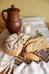 homemade new baked bread on tradional background