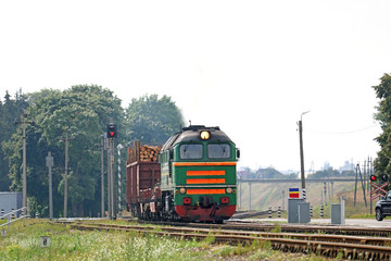 Fototapeta na wymiar freight train passing the level crossing