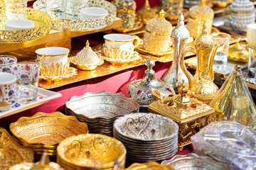 Metal bowls, dishes in market traditional Asian turkish bowls kitchenwear in silver and golden metal