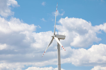 Wind farm close-up against the sky.