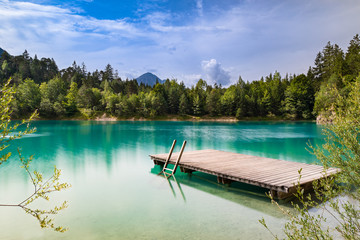 Bathing lake paradise Urisee in Austria, sunny summer day
