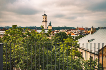 Obraz premium Europe city historical center view point balcony landmark object town hall tower background in autumn cloudy moody weather day