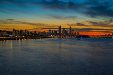 Twilight  of south korea cityscape Modern buildings of city downtown with han river at  seoul city south korea