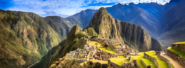 Morning Panorama View of Hidden Saced Inca City Machu Picchu, Aguas Calientes, Cusco Peru - UNESCO World Heritage Pano