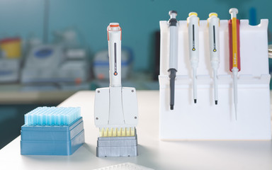 Hand in glove with automatic multichannel pipette for pcr analysis of nucleic acids for novel...