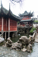 Fototapeta premium Shanghai. February 2019. Yuyuan Garden Yuyuan Garden is a refined garden located north-east of the old city of Shanghai, which houses pavilions, ponds, rocks and enchanting views.