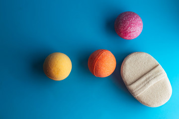 bathroom accessories: bath bombs and a sponge. Natural cosmetics, SPA concept. place for copy space. 