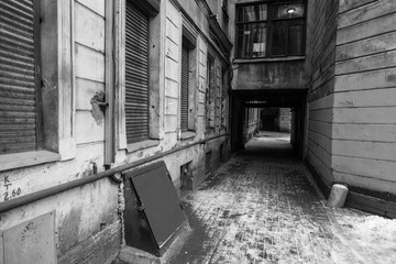 Arch in the entrance courtyard of an old apartment building in St. Petersburg