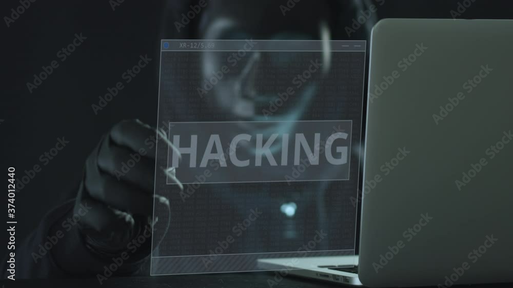 Aufkleber hacker wearing black mask pulls hacking tab from a laptop