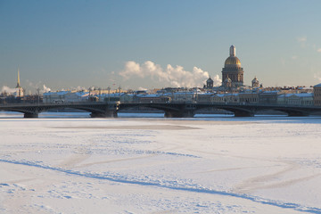 Frozen Neva river cityscape with view on Saont Isaac's cathedral