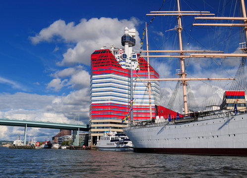 Gota Alv Bridge, Barken Viking From von 1906 And The Tower Skanskaskrapan (Lappstiftet) In The Harbour Lilla Bommen On A Sunny Summer Day With Some Clouds In The Sky