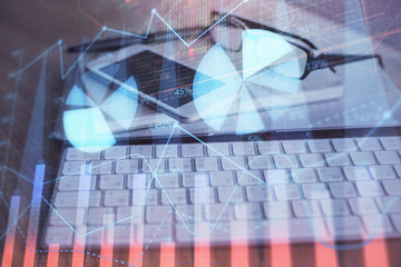 Double exposure of forex chart drawing and cell phone background. Concept of financial trading