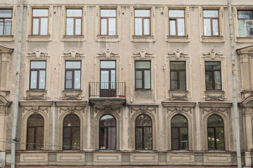 Fototapeta na wymiar Facade of vintage classical building in Saint Petersburg