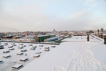 Rooftop of industrial building covered with snow in Saint Petersburg