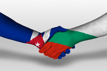 Handshake between bulgaria and cuba flags painted on hands, illustration with clipping path.