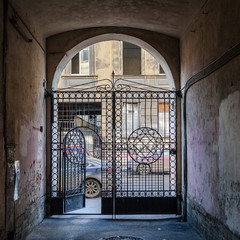 Arch in the entrance courtyard of an old apartment building in St. Petersburg