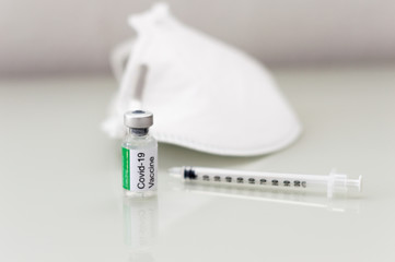Covid vaccine bottle with syringe