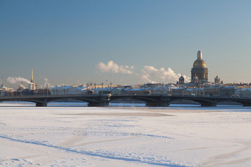 Frozen Neva river cityscape with view on Saont Isaac's cathedral