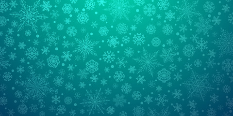 Fototapeta na wymiar Christmas background of various complex big and small snowflakes, in light blue colors