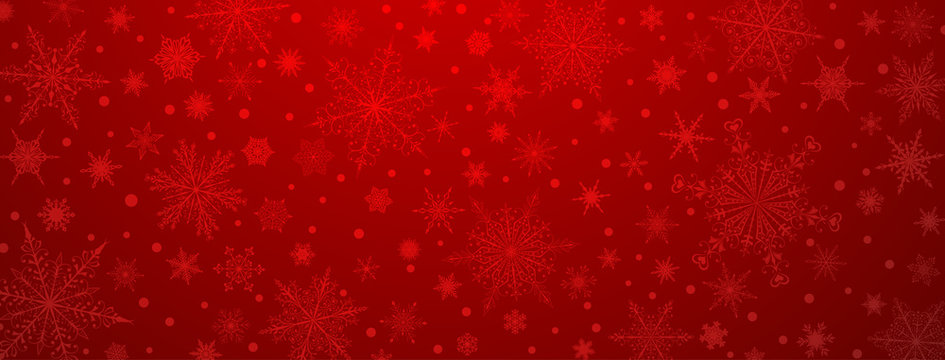 Christmas background of various complex big and small snowflakes, in red colors