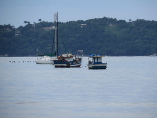Fototapeta premium Fishing boat in flat sea