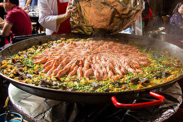 Traditional spanish paella with seafood and pork. Prepared