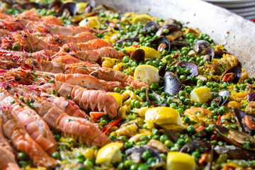 Traditional spanish paella with seafood and pork. Prepared