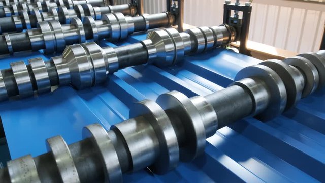 Metal sheet forming machine at the modern metalwork factory.