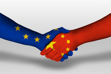 Handshake between china and european union flags painted on hands, illustration with clipping path.