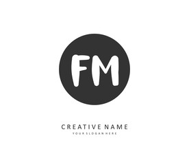 F M FM Initial letter handwriting and signature logo. A concept handwriting initial logo with template element.