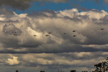 Mexican Air Force helicopters fly over the municipality of Nextlalpan as part of flying excercises.