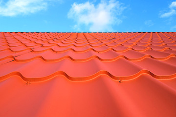 Construction of the roof of the house. Metal roof. The roof is made of metal.