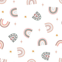 Trendy rainbows in boho style in different color. Vector seamless pattern. Children illustrations for holidays. Doodle art elements. Design for fabric, postcards, bed linens, pillows and wallpaper.