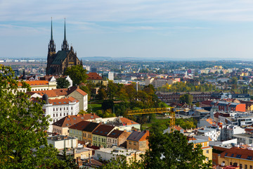 Obraz premium Autumn cityscape of Brno with famous gothic Cathedral of Saints Peter and Paul on sunny day, Czech Republic