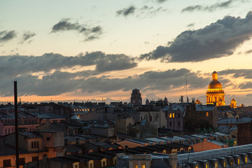 Fototapeta premium Saint Petersburg rooftop cityscape in time of sunset with view on Saint Isaac's cathedral