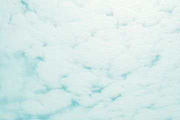 Deep blue sky and white cloud background.In the sky with Altocumulus Perlucidus or Stratocumulus Perlucidus Cloud Background.