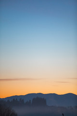 view of sunrise in mountains range