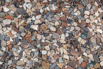 Beach stones background, brown, gray pebbles texture